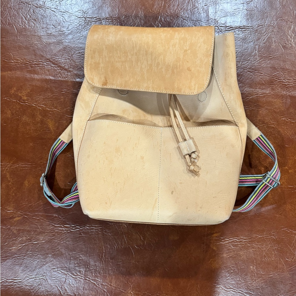 Stylish Tan Backpack with Colorful Straps